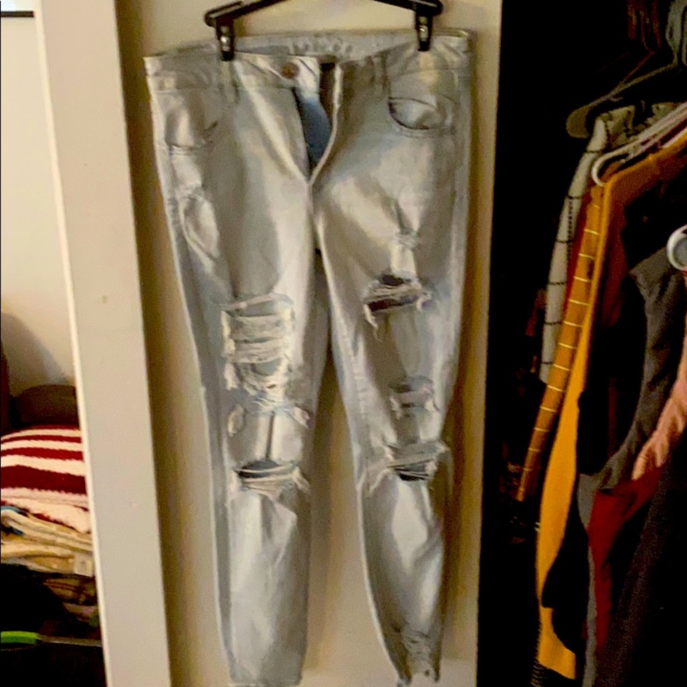 Distressed light wash jeans
